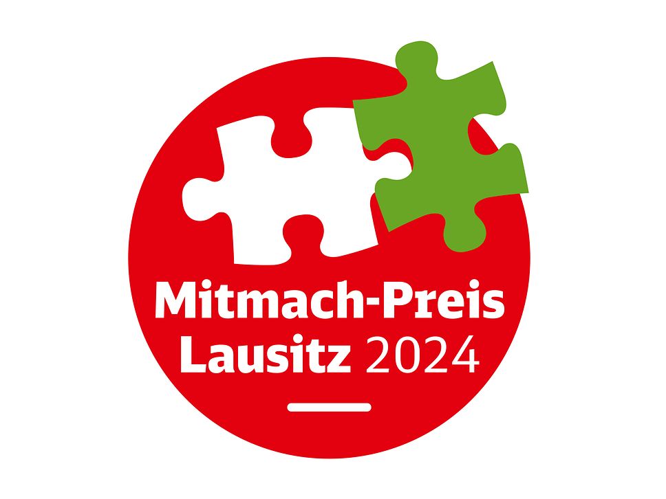Logo für den Mitmachpreis 2024: zwei Puzzle-Teile auf einem roten Kreis
