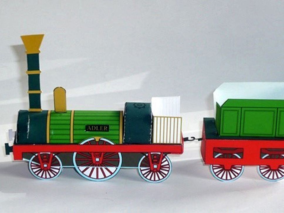 Eine Lok und ein Zugwaggon gebastelt aus Papier.